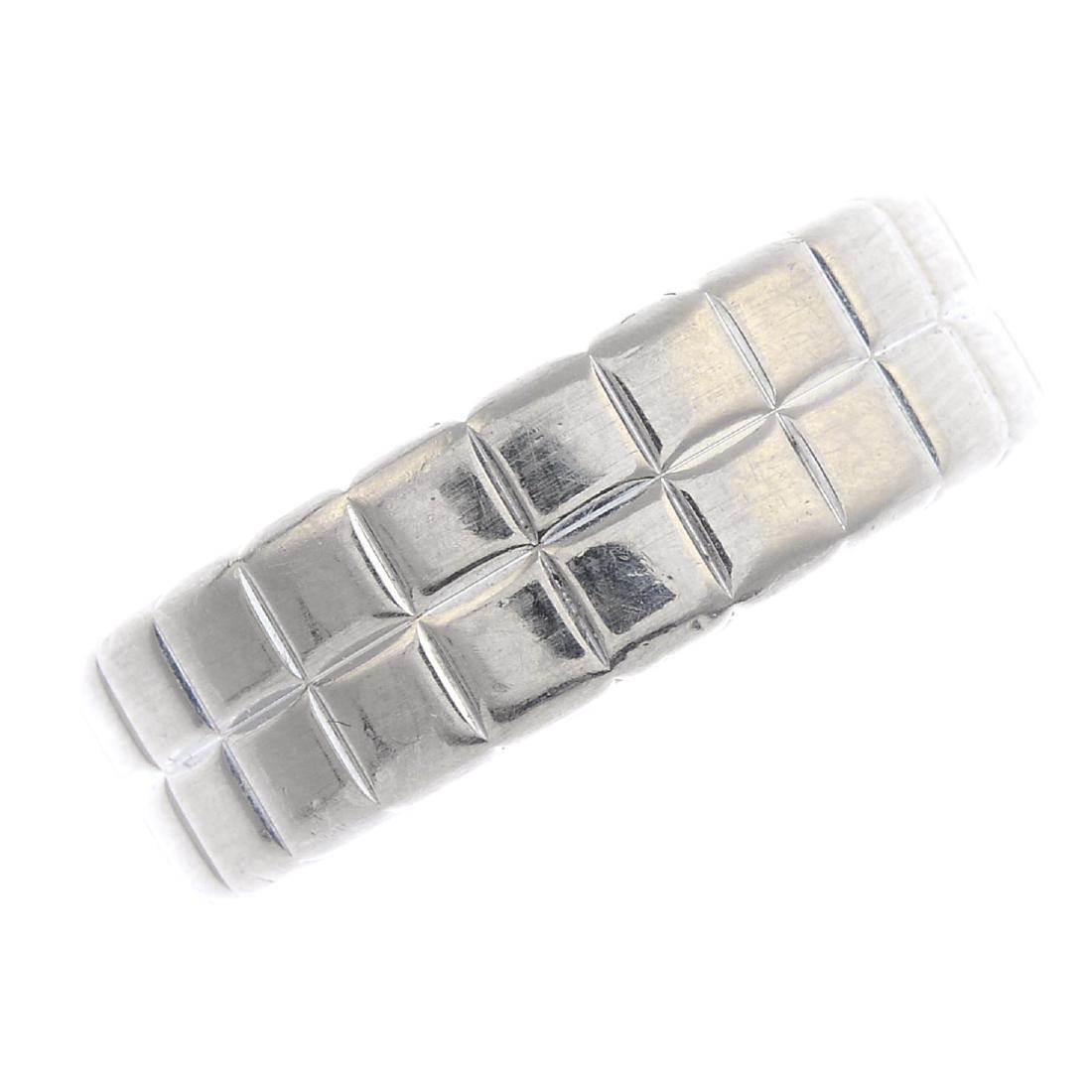 CHOPARD - an 'Ice Cube' ring. Designed as a wide band, (1 of 2)