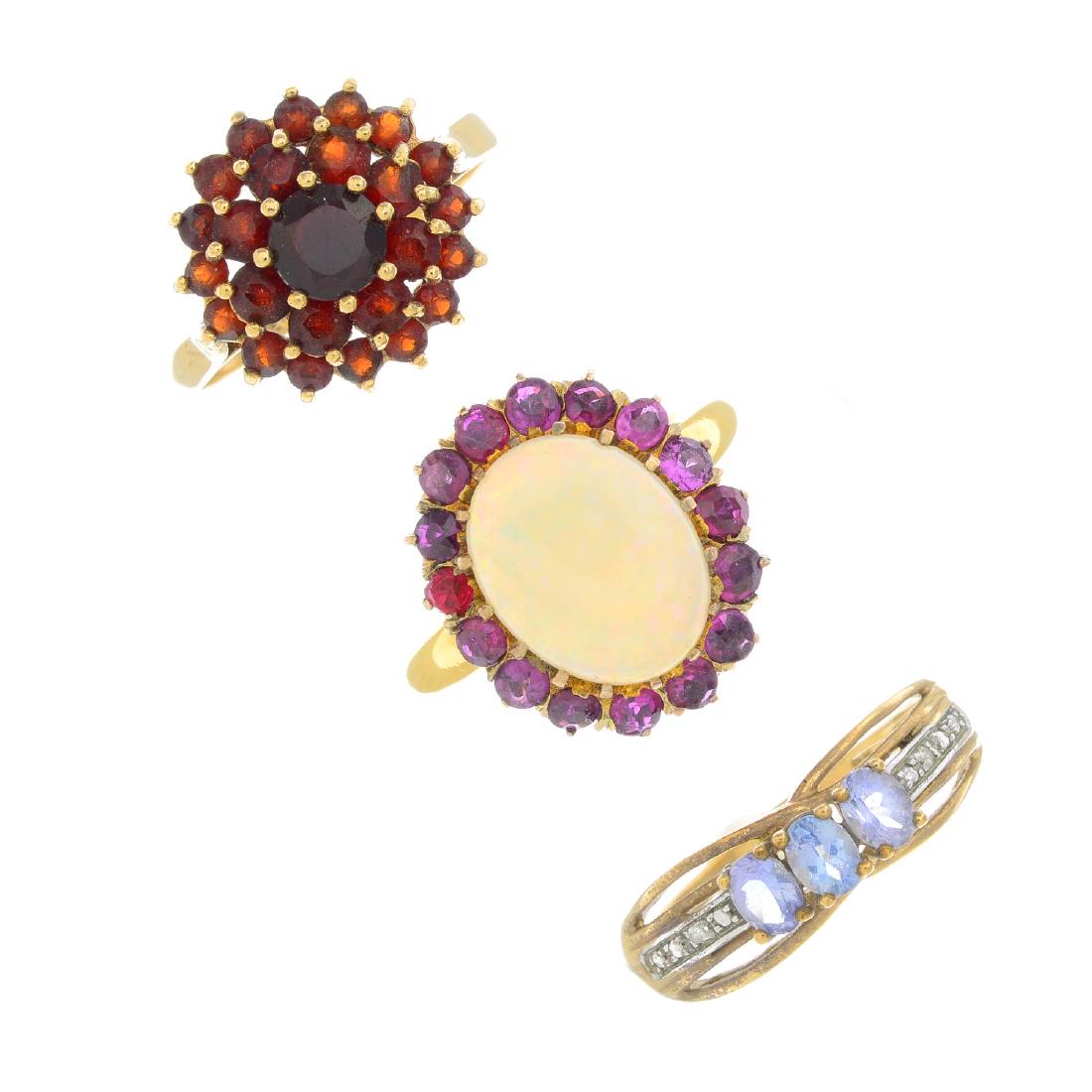 Eight gem-set rings. To include two 9ct gold garnet (1 of 3)