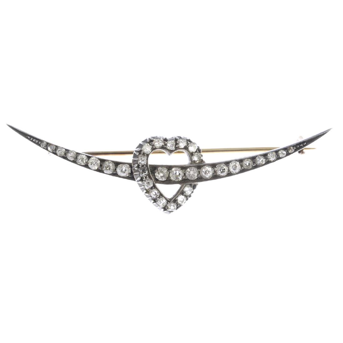 A late Victorian silver and gold diamond heart and (1 of 2)