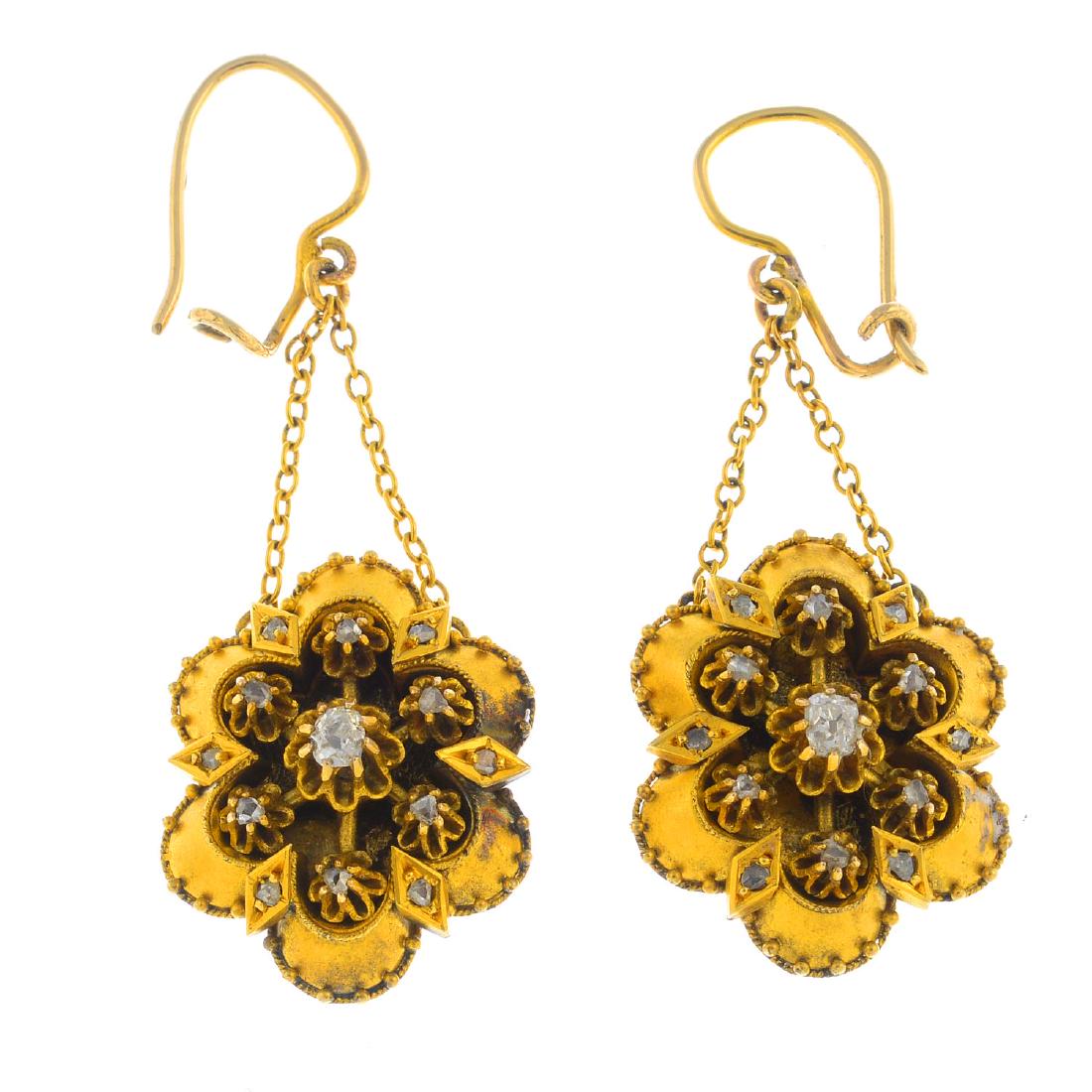 A pair of mid Victorian gold diamond earrings. Each (1 of 2)