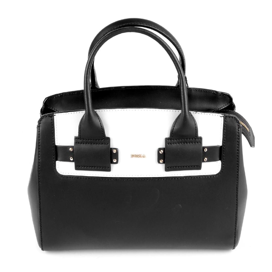 FURLA - a small black and white leather handbag. (1 of 4)