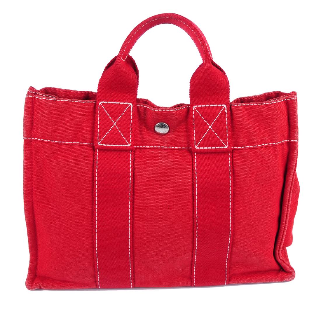 HERMÈS - a small Fourre Tout canvas tote. Crafted from (1 of 3)