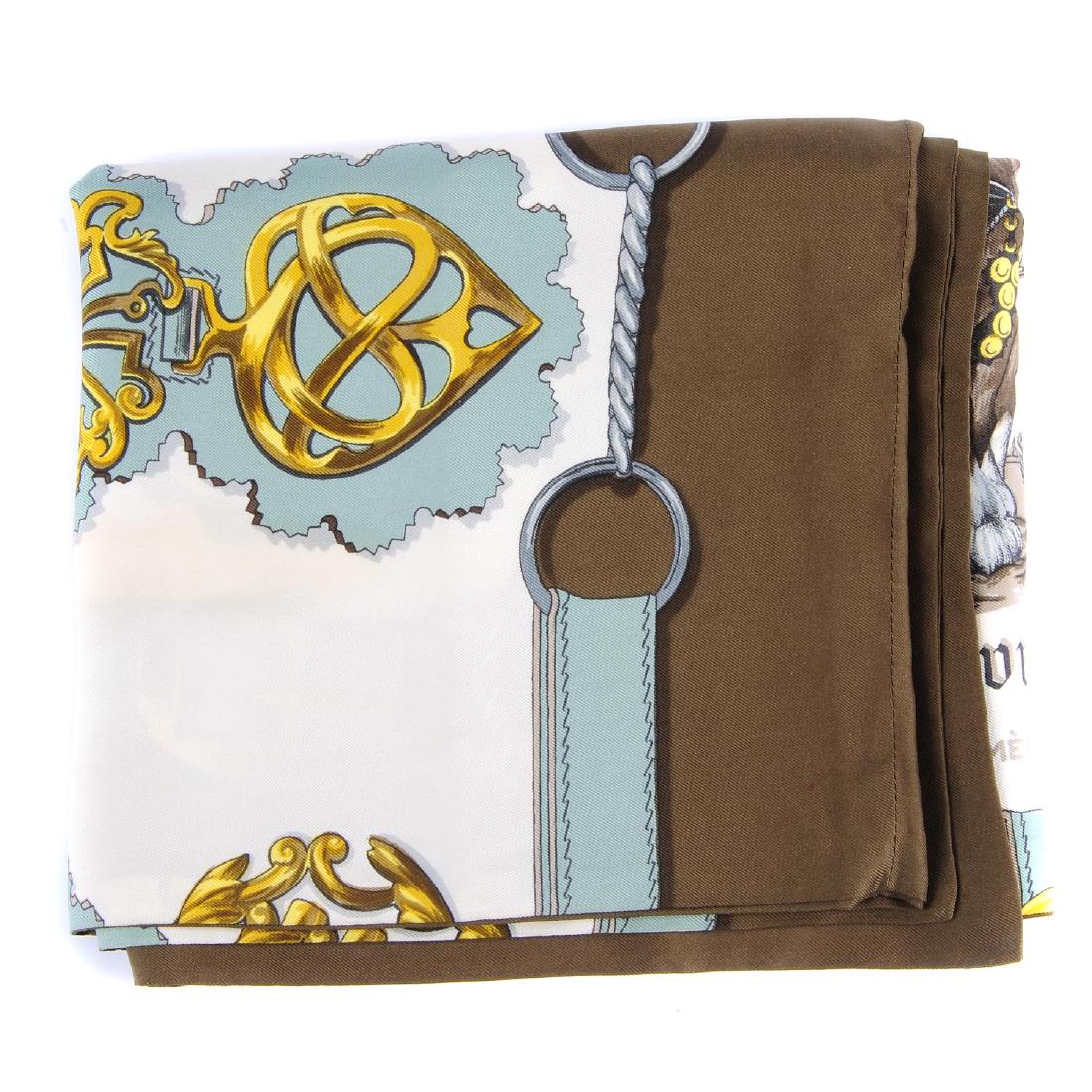 HERMÈS - a 'Cuivreries' long silk scarf. Designed by (1 of 2)