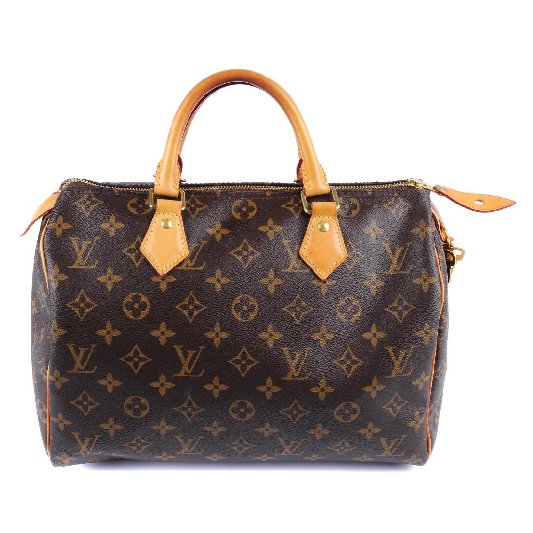 LOUIS VUITTON - a Monogram Speedy 30 handbag. Designed (1 of 5)