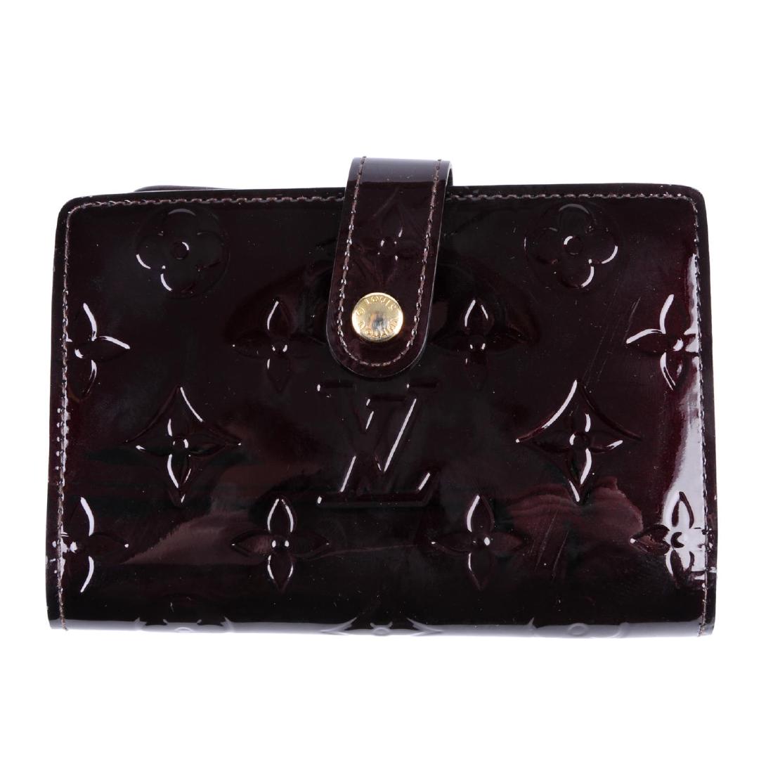 LOUIS VUITTON - an Amarante Vernis Kisslock wallet. (1 of 2)