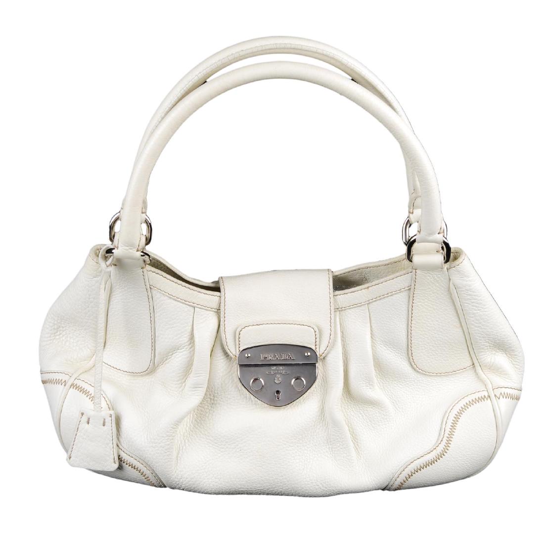 PRADA - a white leather handbag. Crafted from (1 of 4)