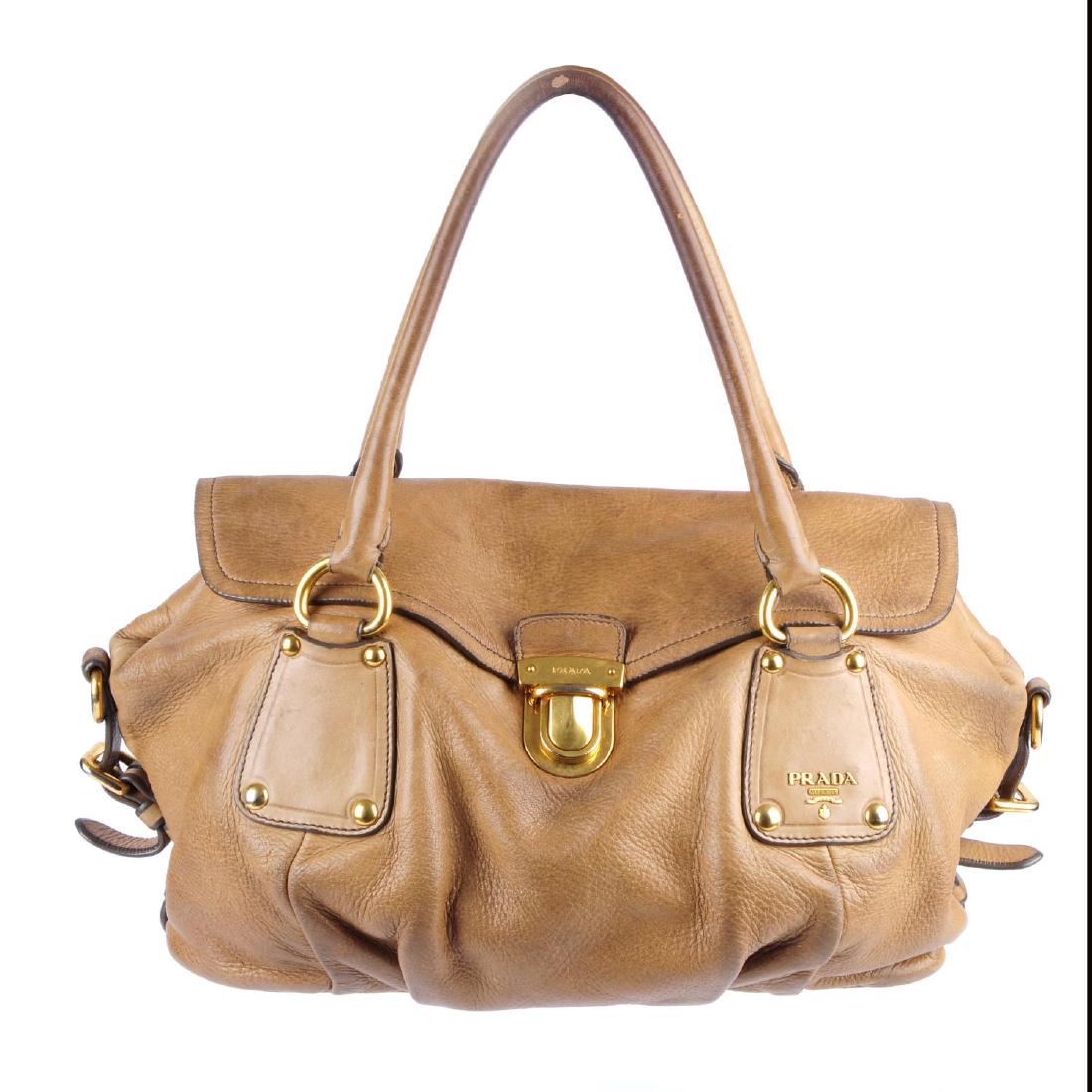 PRADA - a tan leather handbag. Designed with a push (1 of 5)