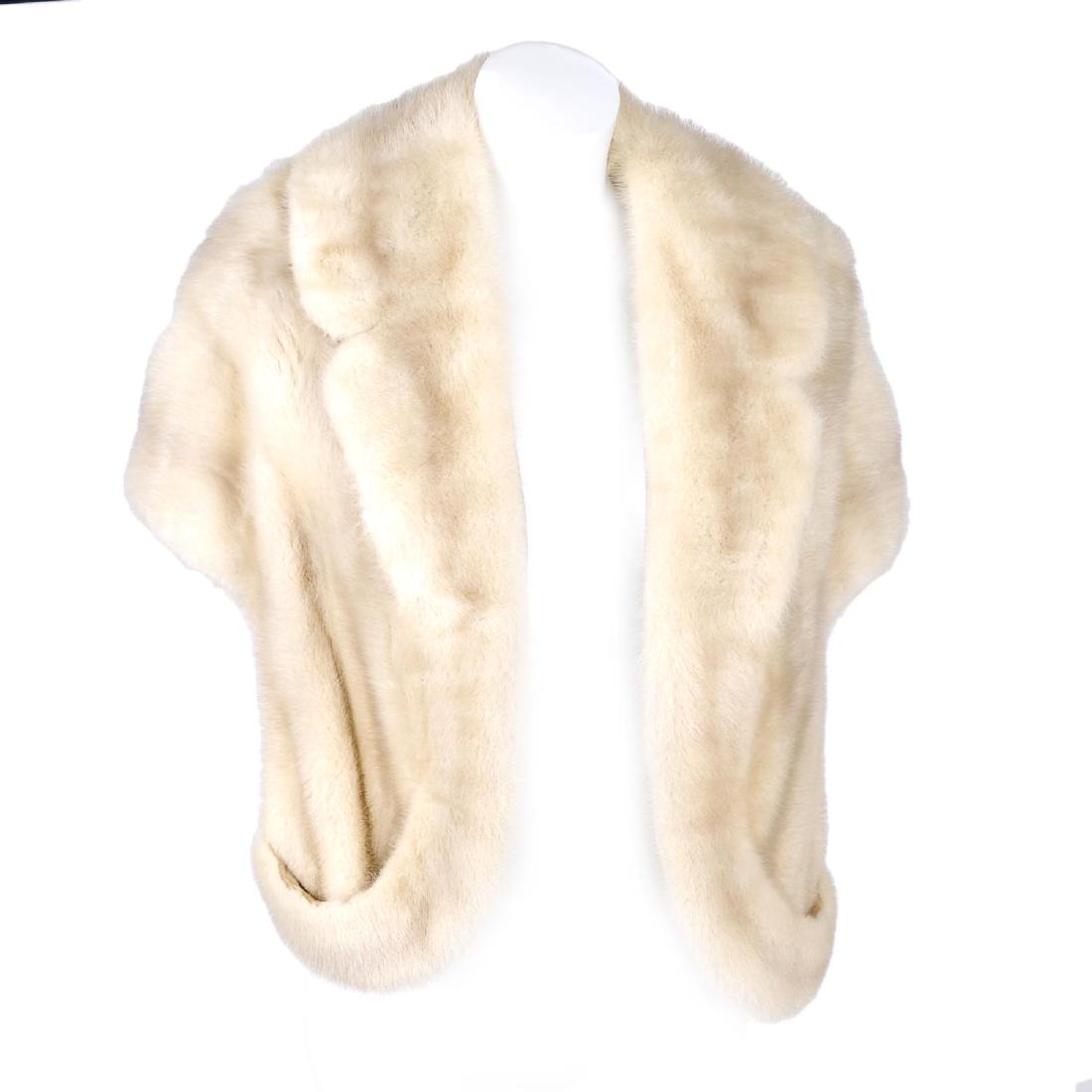 An azurene mink stole. Featuring a notched collar and (1 of 2)