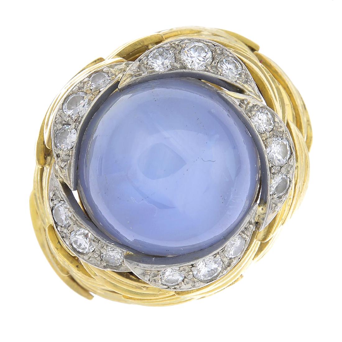 GRIMA - a 1970s 18ct gold star sapphire and diamond: GRIMA - a 1970s 18ct gold star sapphire and diamond dress ring. The circular star sapphire cabochon, with brilliant-cut diamond crescent surround, to the grooved crescent openwork sides and band. Sign