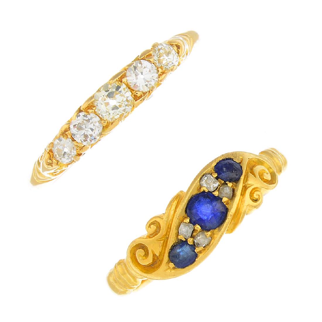 Two late Victorian gold diamond and gem-set rings. The: Two late Victorian gold diamond and gem-set rings. The first designed as a graduated circular-shape sapphire three-stone line with old-cut diamond spacers and scrolling sides, the second designed as a