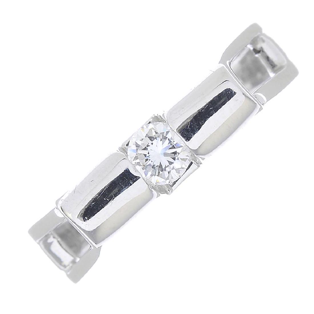 CHIMENTO - an 18ct gold diamond single-stone ring. The: CHIMENTO - an 18ct gold diamond single-stone ring. The brilliant-cut diamond, tension-set to the curved sides, with openwork shoulders and grooved band. Signed Chimento. Estimated diamond weight 0.20c
