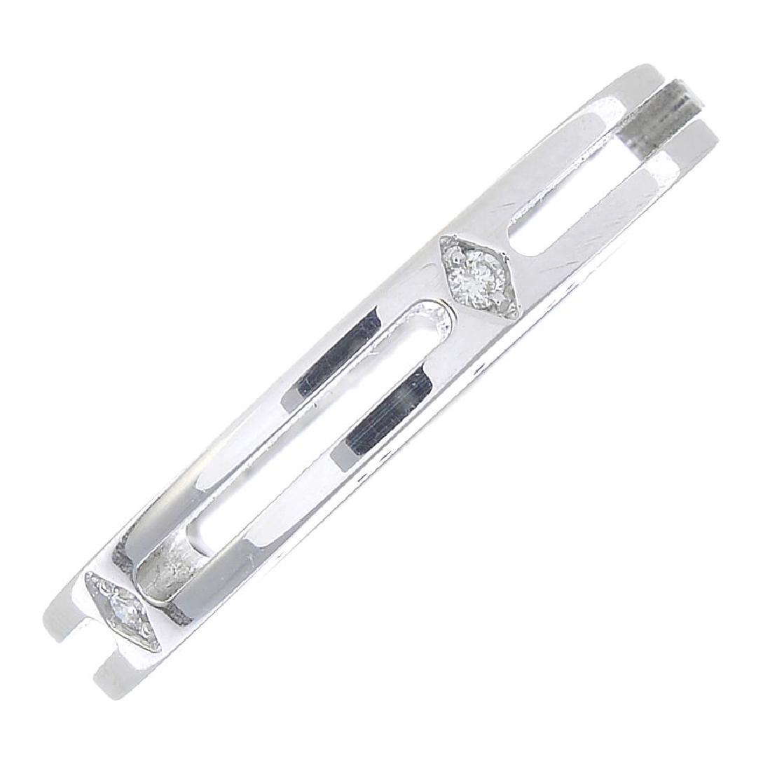 CHIMENTO - an 18ct gold diamond ring. Of openwork: CHIMENTO - an 18ct gold diamond ring. Of openwork design, with brilliant-cut diamond highlights and 'Chimento' stamped side. Signed Chimento. Italian marks. Ring size L. Weight 4.2gms.