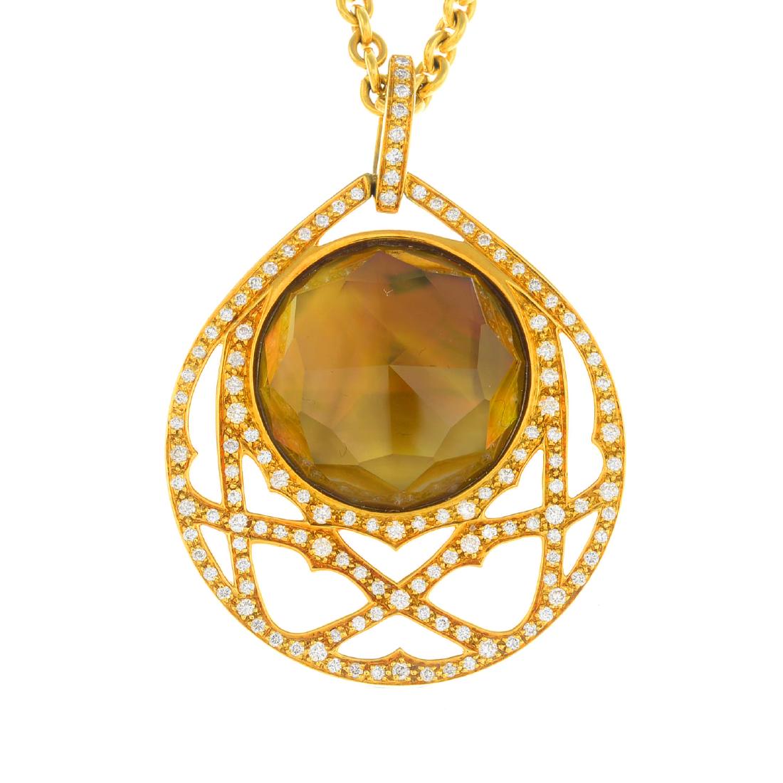 STEPHEN WEBSTER - an 18ct gold diamond and gem-set: STEPHEN WEBSTER - an 18ct gold diamond and gem-set 'Crystal Haze' pendant. Of openwork design, the circular citrine and mother-of-pearl doublet, with pave-set diamond geometric surround, suspended fro