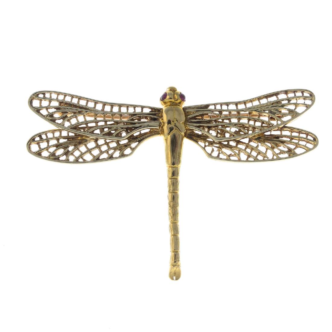 A 9ct gold ruby dragonfly brooch. The textured (1 of 2)