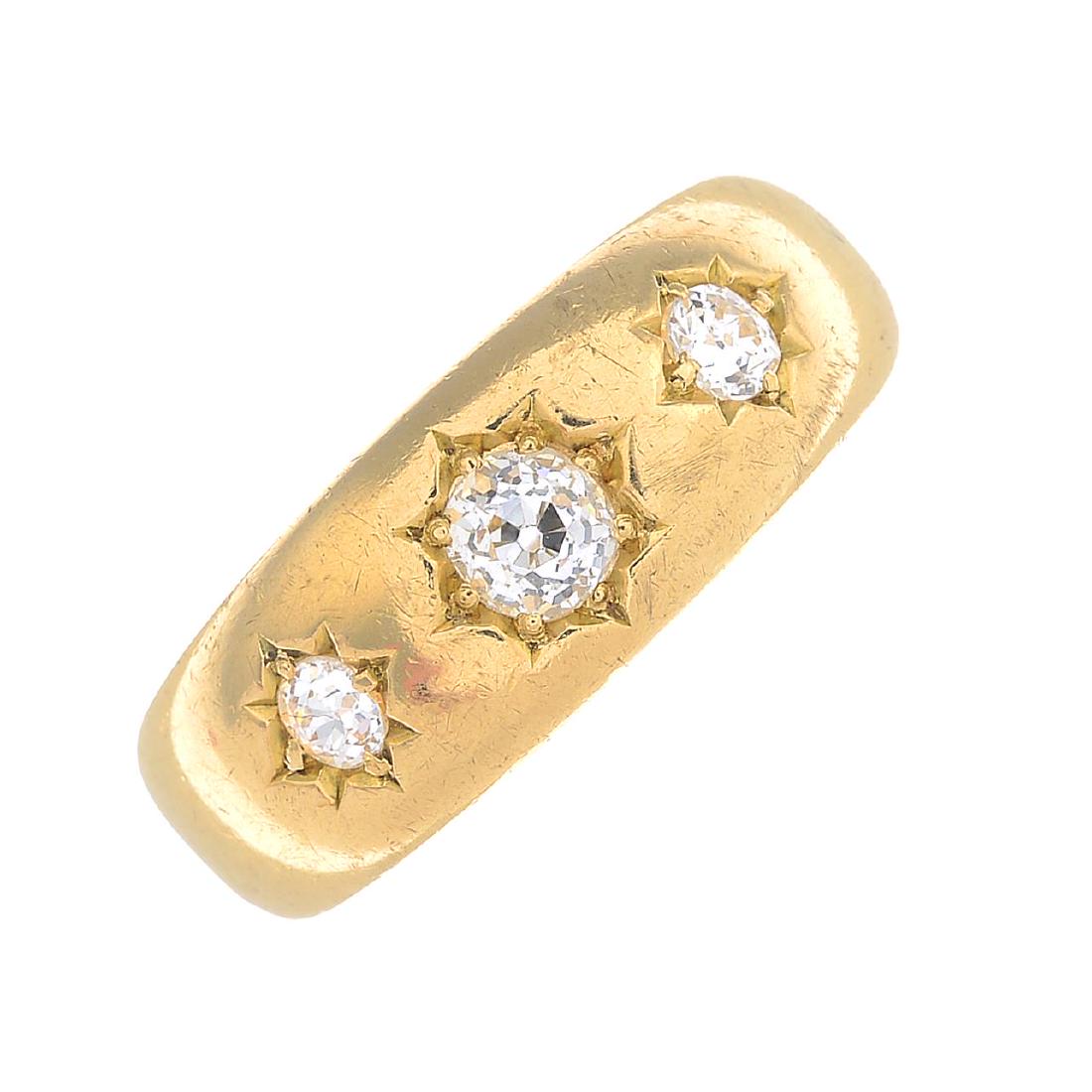 A late Victorian 18ct gold diamond three-stone ring. (1 of 3)