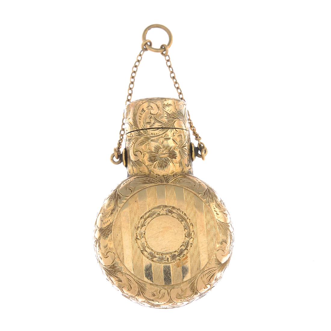 An early 20th century 14ct gold perfume case. With (1 of 3)