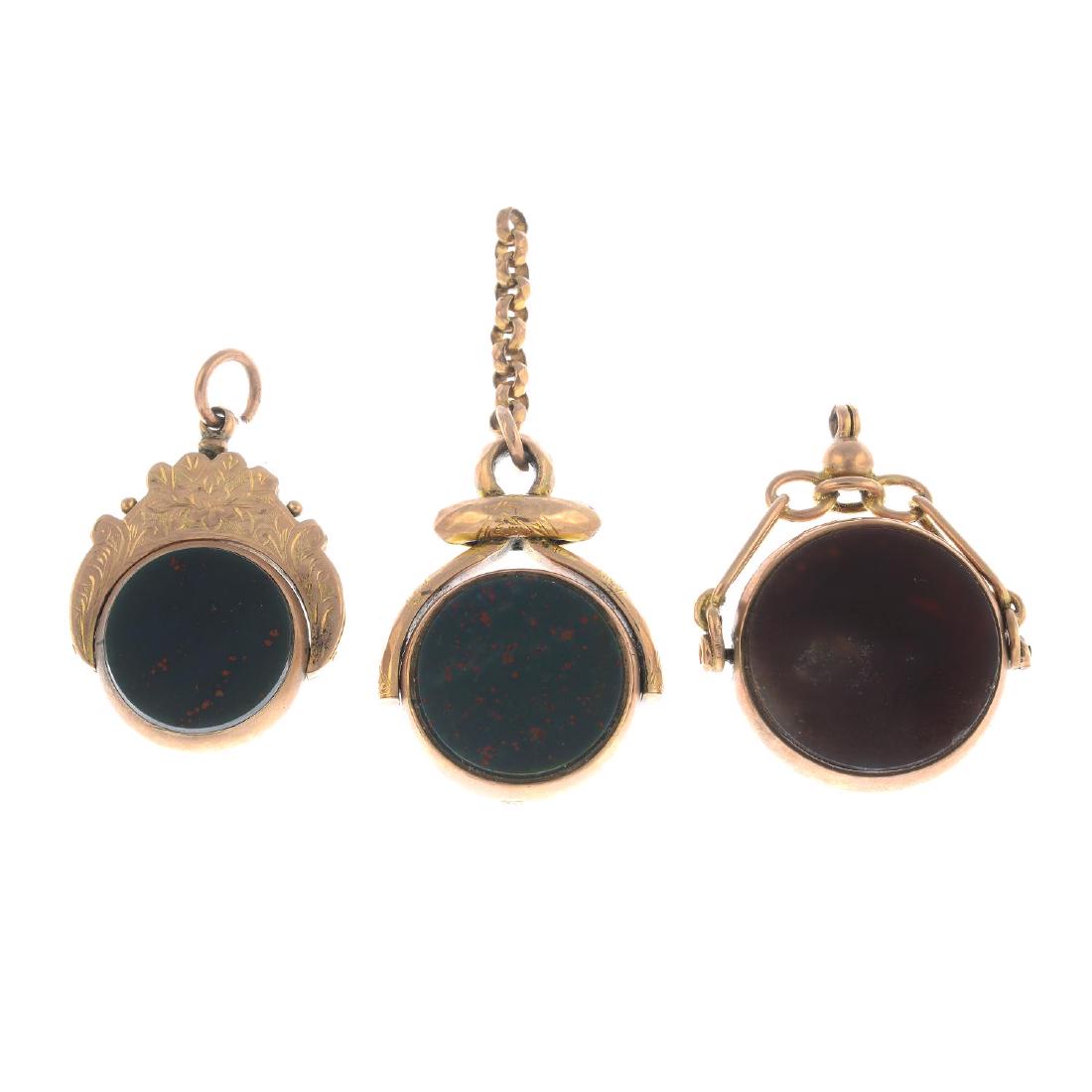 Three early 20th century bloodstone and carnelian: Three early 20th century bloodstone and carnelian swivel fobs. Two with hallmarks for Chester, 1907 and Birmingham 1904. Lengths 3.4-3.5cms. Total Weight 22.5gms.