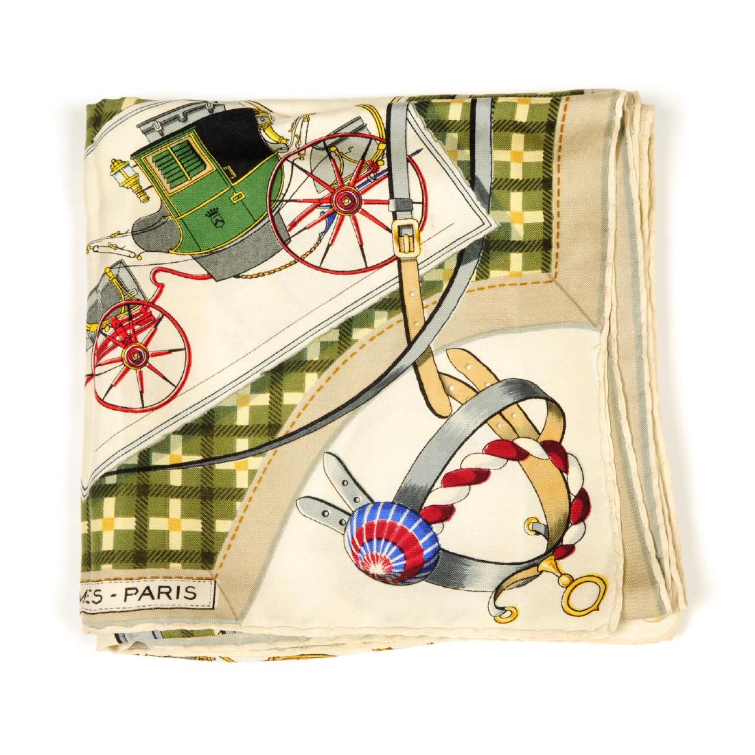 HERMÈS - a 'Les Voitures Nouvelles' silk scarf.: HERMÈS - a 'Les Voitures Nouvelles' silk scarf. Featuring a variety of different coaches on a green and cream plaid patterned background. Measuring 90 by 90cms.