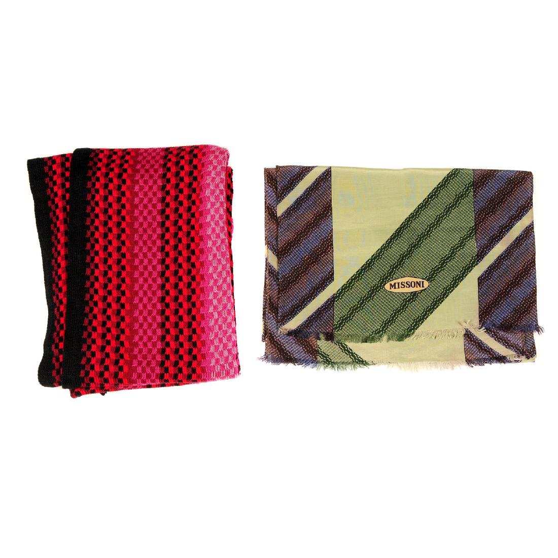 MISSONI - two scarves. To include a wool scarf with a: MISSONI - two scarves. To include a wool scarf with a black and pink check pattern and fringed detailing along the two edges, together with a green and brown diagonal patterned silk scarf. Labelled Mi