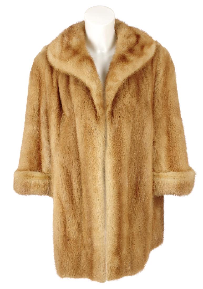 A pastel mink coat and squirrel fur stole. The coat,: A pastel mink coat and squirrel fur stole. The coat, designed with a lapel collar, an open front, cocktail cuffs, two outer pockets and an inner ribbon tie, together with a squirrel fur stole. Chest m