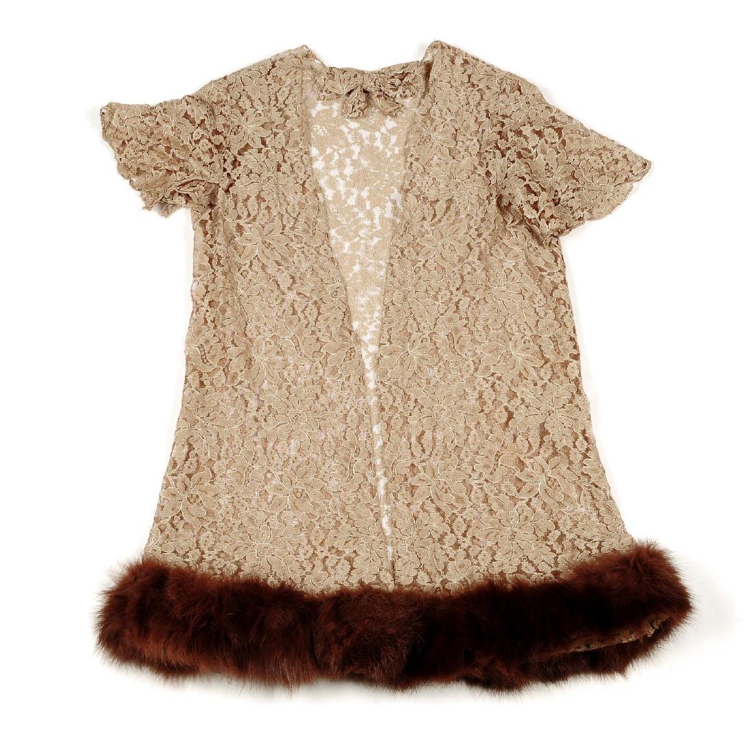 A collection of fur garments. To include a lace: A collection of fur garments. To include a lace cardigan with coney fur trim, a pastel mink stole and mink hat, together with two further neck ties.