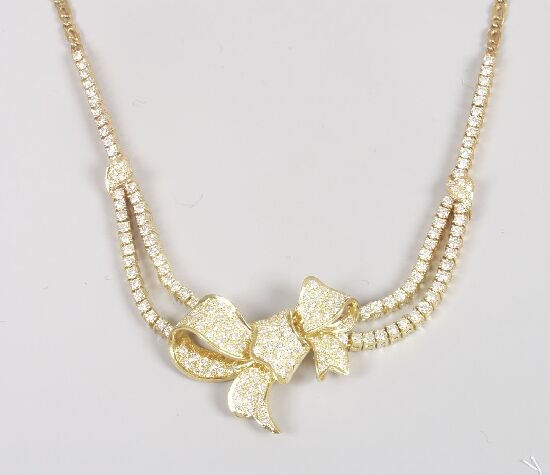 18ct gold and diamond necklace, set to