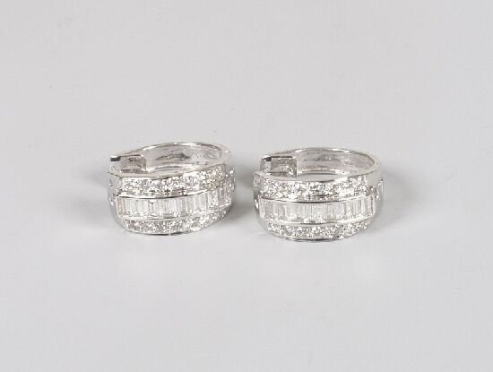 Pair of 18ct white gold three row diamo