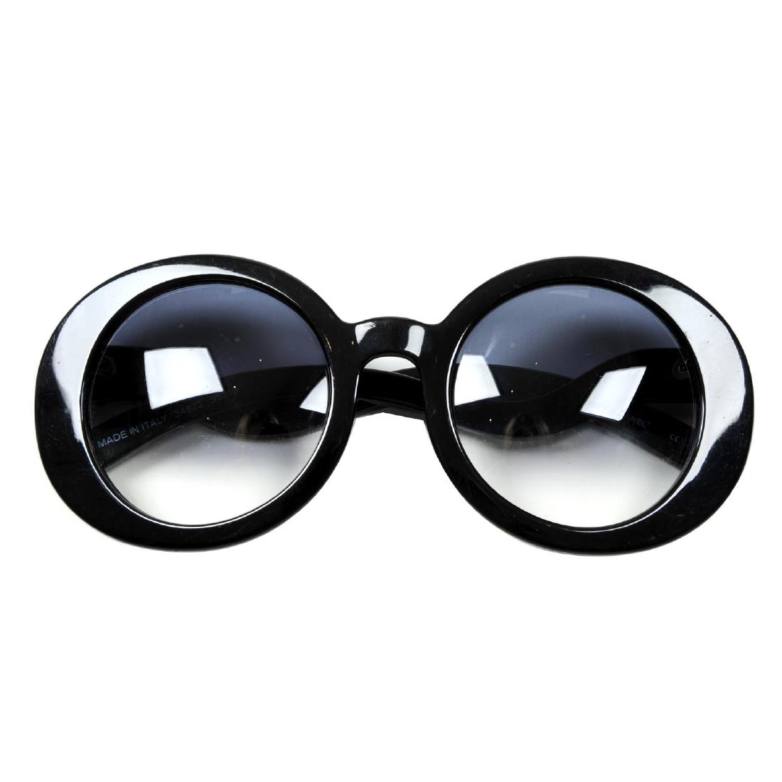 CHANEL - a pair of sunglasses. Designed with thick (1 of 4)