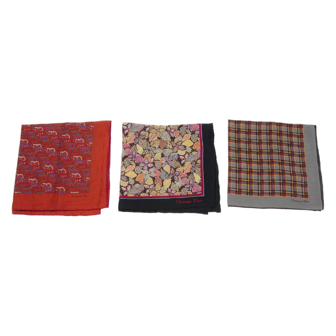 CHRISTIAN DIOR - six silk handkerchiefs. Featuring a: CHRISTIAN DIOR - six silk handkerchiefs. Featuring a variety of different patterns and colours. Measuring 43 by 43cms.