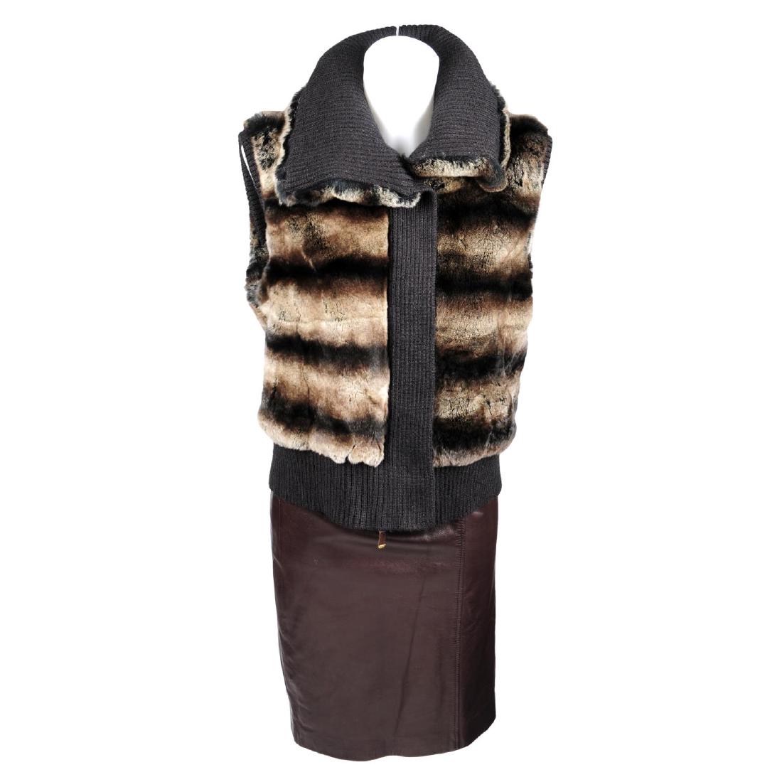 ESCADA - three items of clothing. To include a coney: ESCADA - three items of clothing. To include a coney fur gilet with brown ribbed wool trim, front zip and button fastenings, together with a blue wool and silk panelled t-shirt and a plum lambskin lea
