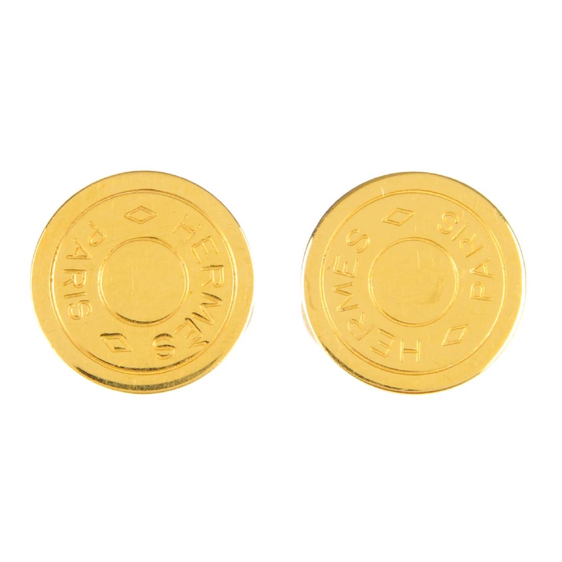 HERMÈS - a pair of clip-on earrings. Of circular (1 of 2)