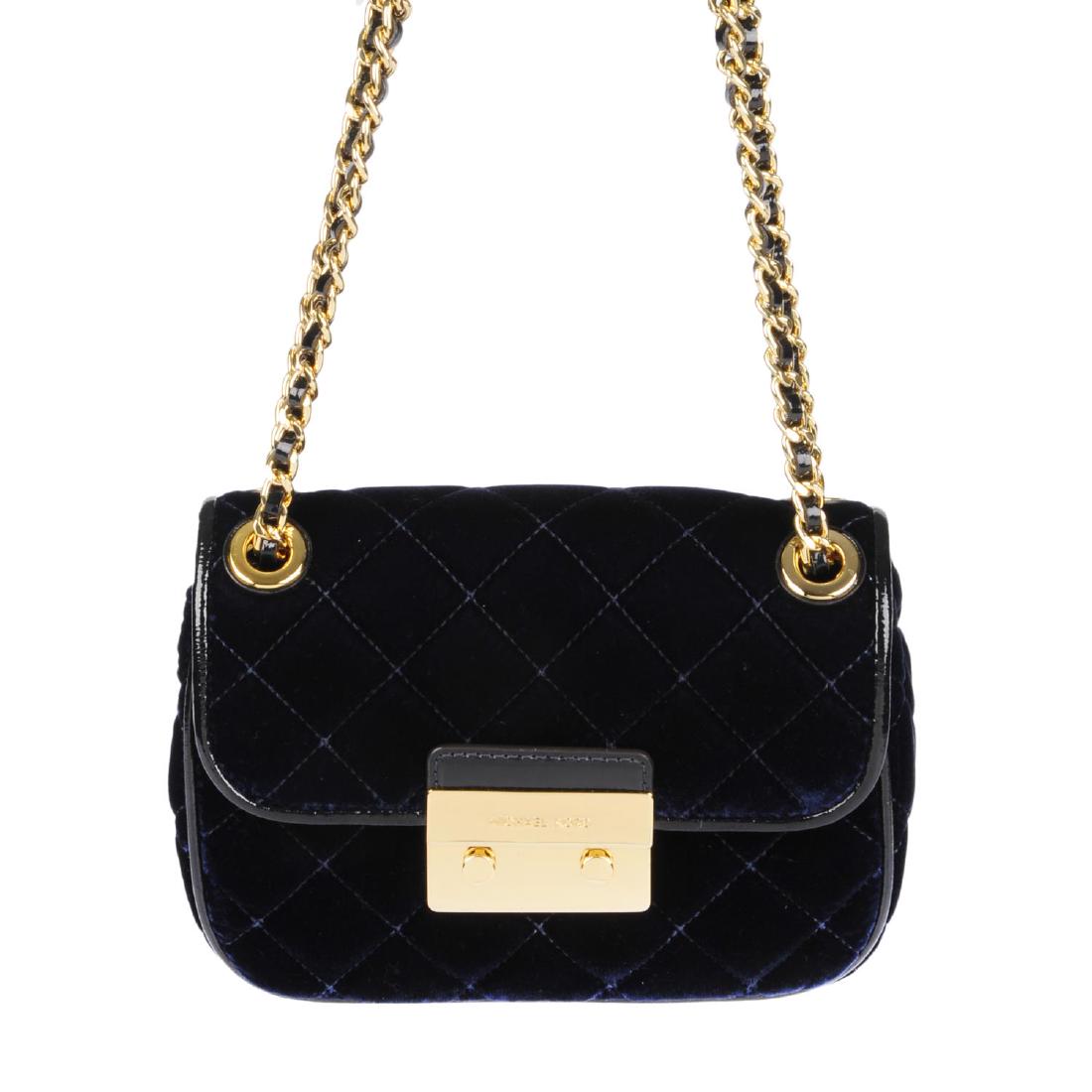 MICHAEL KORS - a velvet quilted Sloan Editor handbag.: MICHAEL KORS - a velvet quilted Sloan Editor handbag. Featuring navy blue velvet exterior with diamond quilting, with navy patent trim, gold-tone hardware, woven chain shoulder strap, front lock faste