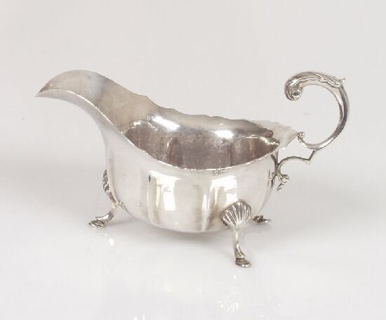 A Georgian style sauceboat, of lobed fo