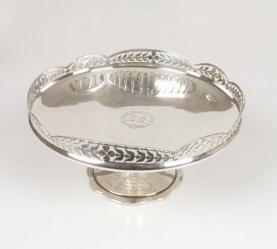 A silver tazza with floral and foliate