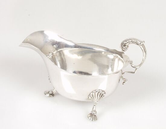 An Irish silver sauce boat with fret wo