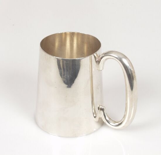 A silver christening mug of tapering fo