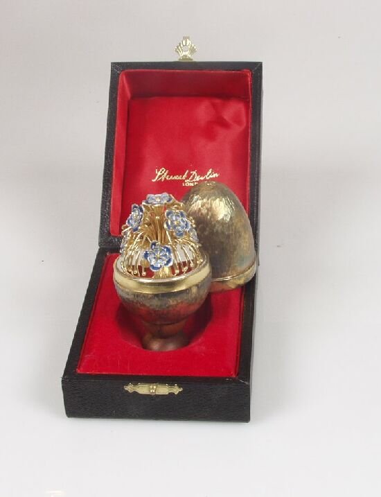 Stuart Devlin - a silver gilt egg conta