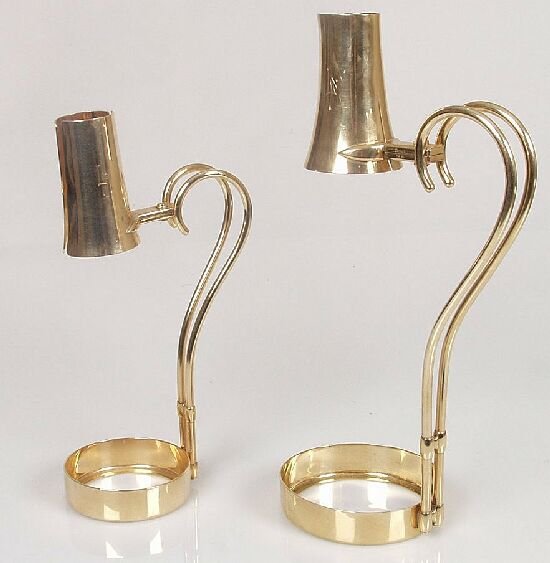 Cartier - a pair of 14ct gold wine bott