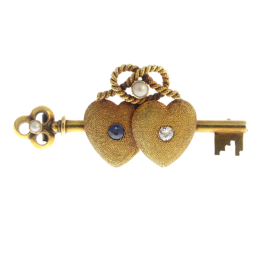 A late Victorian 18ct gold diamond, sapphire and split (1 of 2)