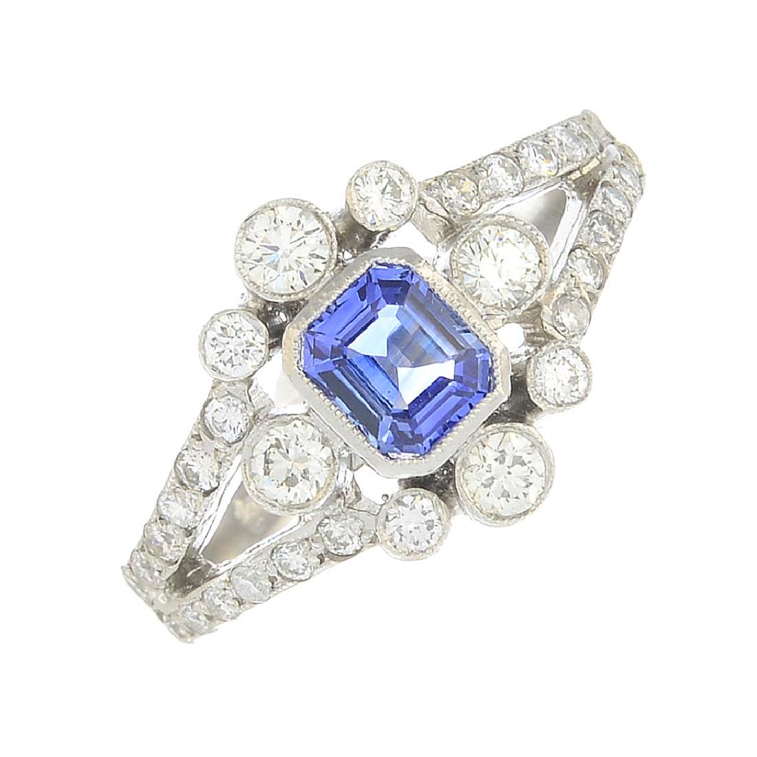 A sapphire and diamond dress ring. Sapphire calculated (1 of 3)