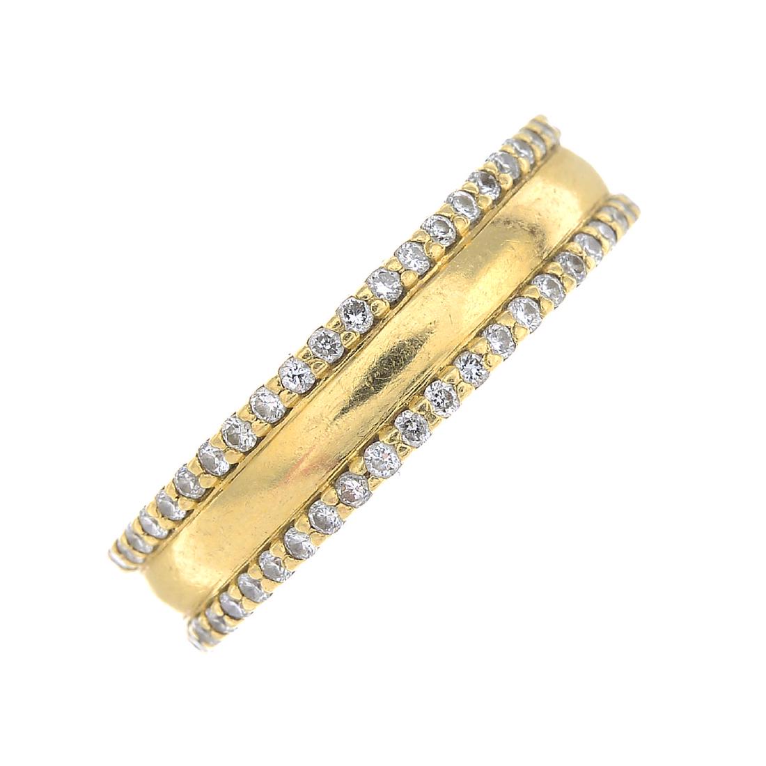 An 18ct gold diamond band ring.Estimated total diamond (1 of 3)