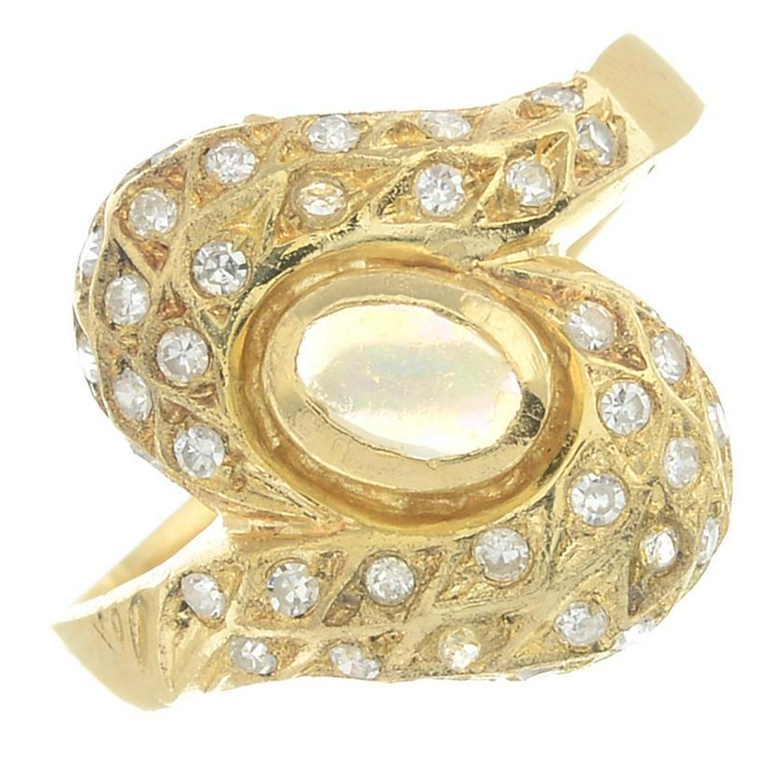 An opal and diamond crossover ring.Estimated total (1 of 6)
