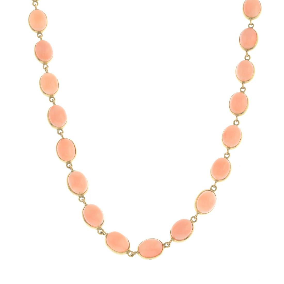 An 18ct gold coral necklace, by Chimento.Signed: An 18ct gold coral necklace, by Chimento.Signed Chimento. Estimated dimensions of one coral cabochon 9.1 by 7.5 by 4.1mms. Italian marks.Length 42cms. 26.7gms. Coral untested.