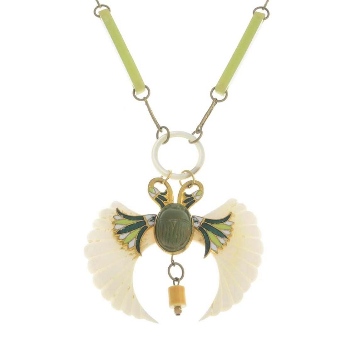 An early 20th century Egyptian Revival gem-set and (1 of 2)