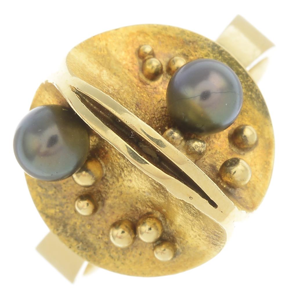 A cultured pearl ring.Ring size P. 6.5gms. (1 of 3)