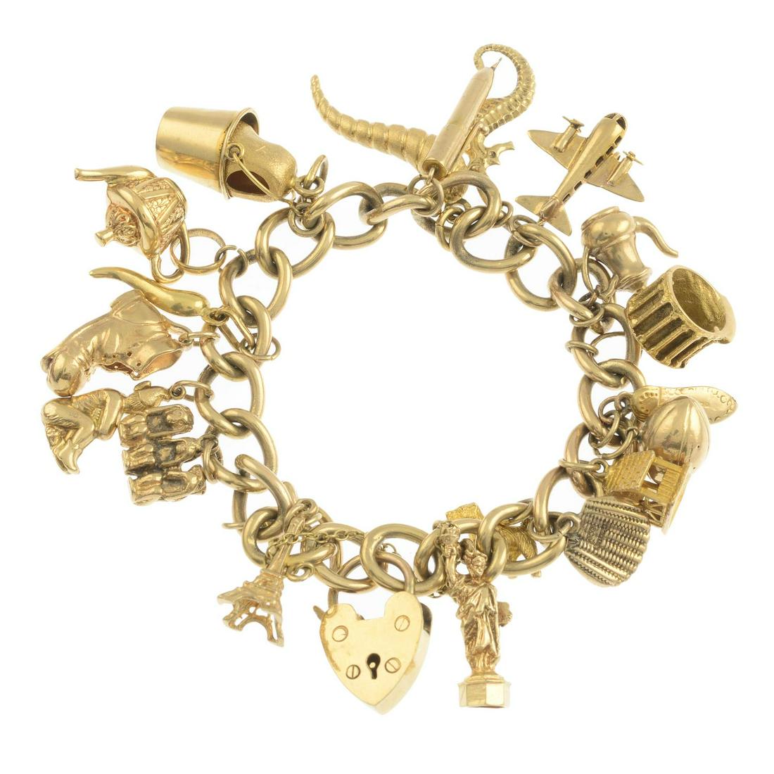 (54788) A 1970s 9ct gold charm bracelet, with (1 of 2)
