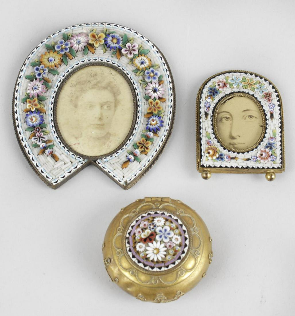 Two small Victorian micromosaic panel decorated: Two small Victorian micromosaic panel decorated photograph frames, (each now lacking easel style folding supports), together with a similar circular pill box, the hinged cover with micromosaic inset p