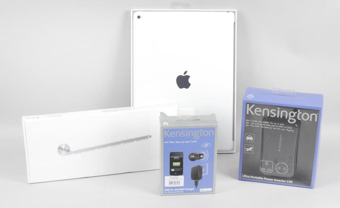 A group of assorted electricals, to include an Apple: A group of assorted electricals, to include an Apple wireless keyboard, an Apple mouse, an Apple iPad Pro silicone case, a Linx B-Tube Hi-Fi speaker, three Kensington ultra portable power inverters, a