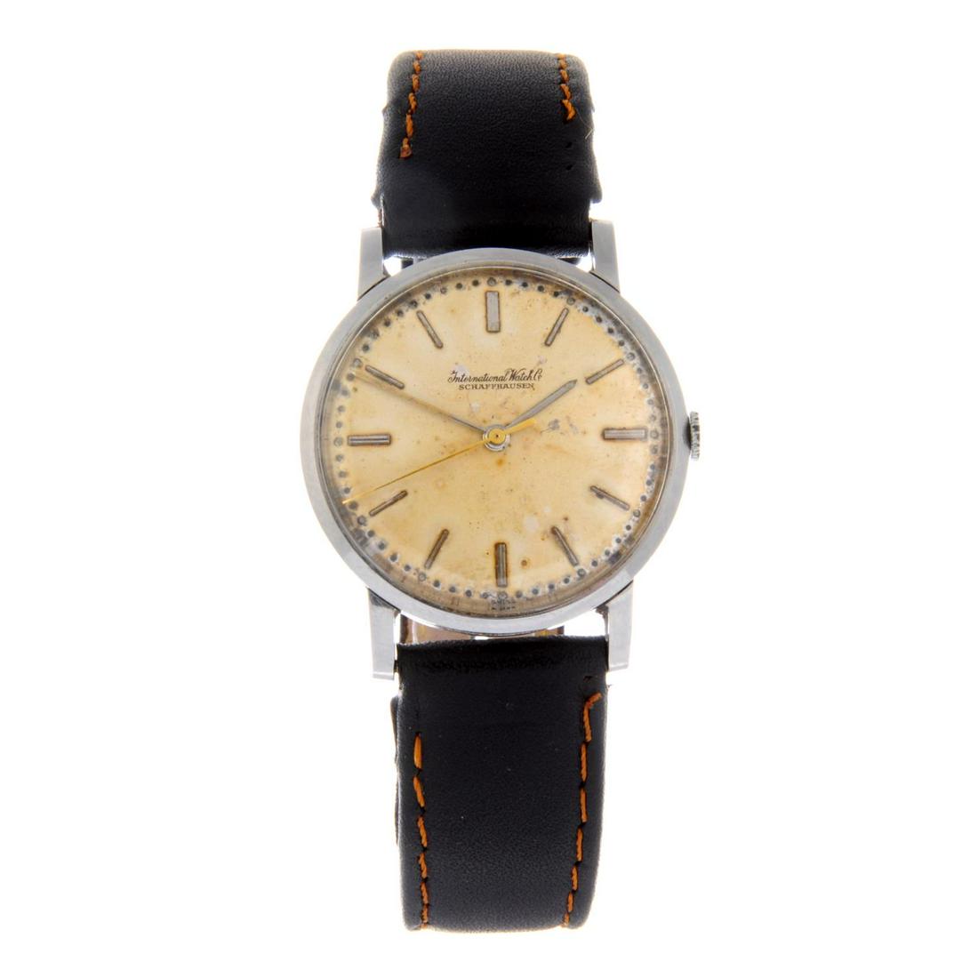 IWC - a gentleman's wrist watch. Stainless steel case.: IWC - a gentleman's wrist watch. Stainless steel case. Numbered 1626628. Signed manual wind calibre 401. Discoloured silvered dial. Fitted to an unsigned black leather strap with base metal pin buckle