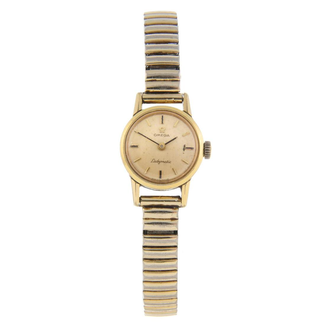 OMEGA - a lady's Ladymatic bracelet watch. Gold plated: OMEGA - a lady's Ladymatic bracelet watch. Gold plated case with stainless steel case back. Reference 5510023. Signed automatic calibre 661. Champagne dial. Fitted to an unsigned gold plated expandabl